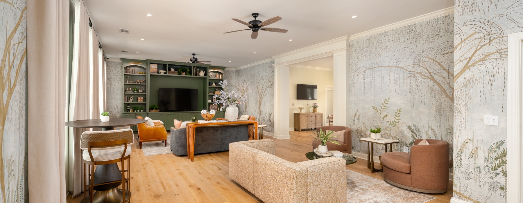 Living area that connects to well-lit living and dining areas