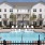 wide view of uniquely shaped swimming pool showing multiple reclining seats, spacious walking areas & nearness to the property